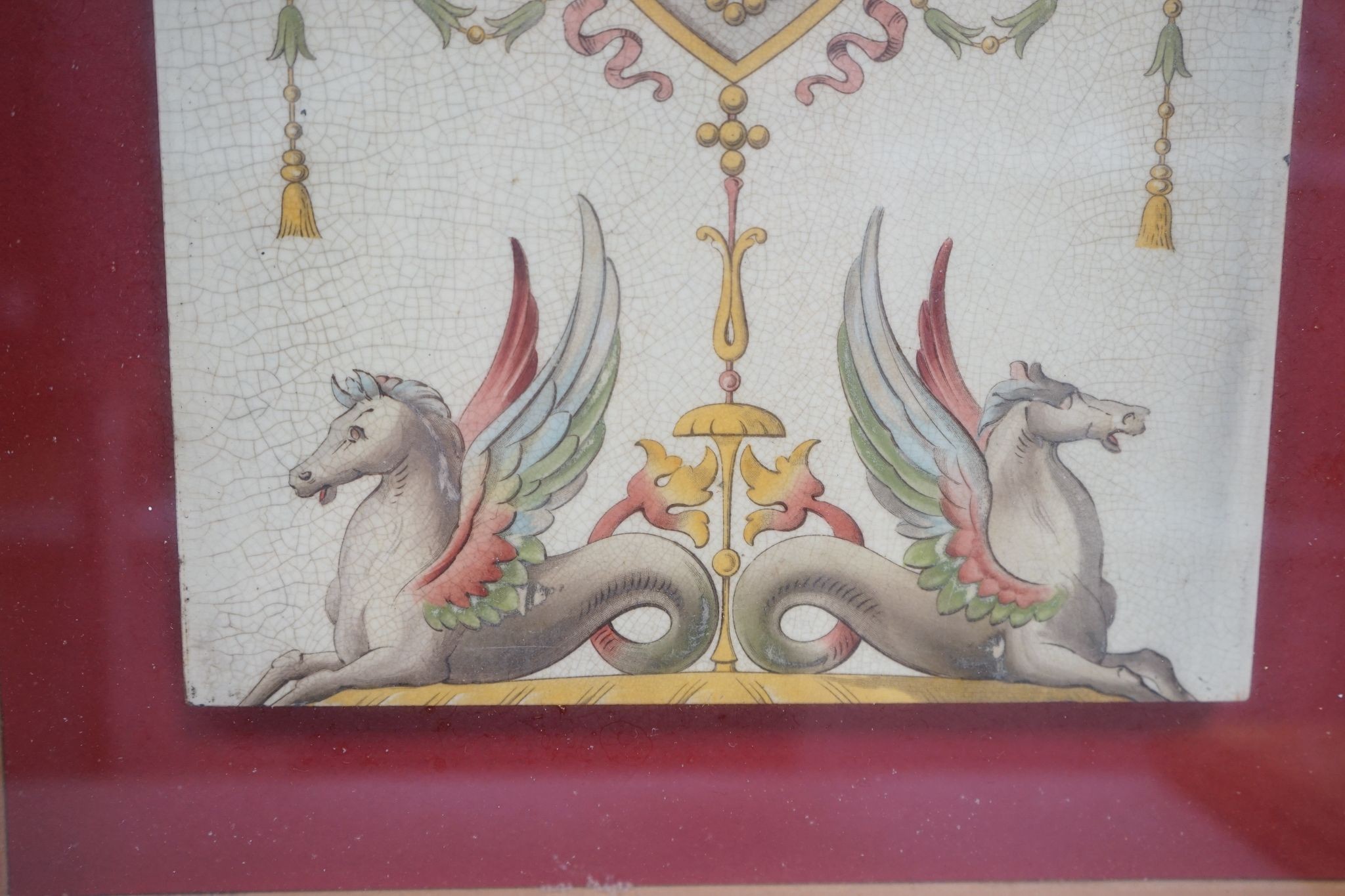 A late 19th century twin-tile panel, framed, tiles 20cm square